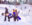Acrylic winter scene showing snowboarders and skiers walking across a snowy hill while others descend nearby runs.