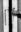 Black-and-white close-up photograph of a weathered barn door with metal chains hanging from aged wooden planks.