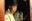 Documentary photograph of people in traditional ceremonial clothing gathered inside a warmly lit interior during a Confucian ceremony in Daegu, South Korea.