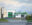 Realist oil painting of a National Car Rental building and truck depot viewed from across a quiet city street beneath an overcast sky.