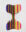 Colourful abstract painting featuring mirrored curved panels with vivid rainbow gradients in pink, yellow, green, blue, and purple on a white pedestal.