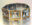 Contemporary bracelet with hinged sterling silver panels, gold accents, and iron pyrite cube settings.