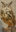 Close-up painting of an owl with striking amber eyes perched on a falconer's gloved arm, painted across stitched canvas panels.